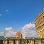U vagonu gdje se vraćamo sebi, Panorama Firence s kupolom Duoma i Palazzo Vecchijem pod plavim nebom