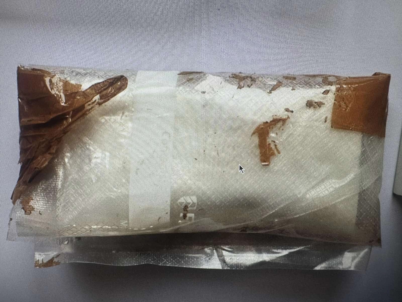 U Tuzli pronađena droga, oduzet heroin, kokain i oružje