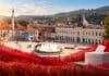 Pod Tuzlom se crveni meraja: Kako je glasala Tuzla Kako je glasala Tuzla, panorama Trga slobode s crvenim detaljima i glasačkom kutijom.